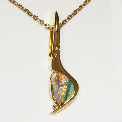 Custom made 18k Yellow Gold Opal Pendant. Sparkly and bright, orange and gold with green in between